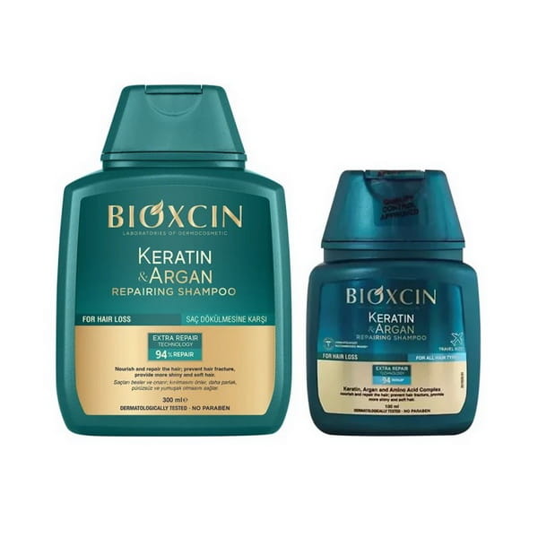 شامپو ترمیم کننده و ضد ریزش مو بیوکسین حاوی کراتین و روغن آرگان 300 + 100 میل